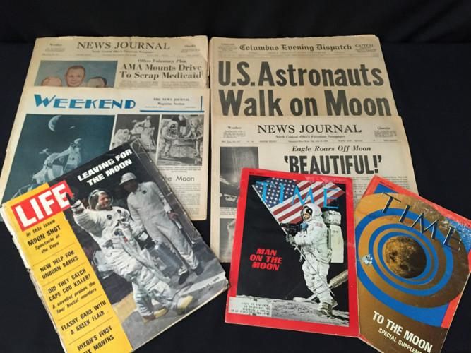 Newspape headline: Astronauts Walk on Moon