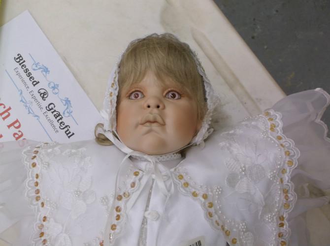 Creepy Baby Doll in Bonnet