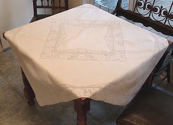 Antique pulled lace tablecloth