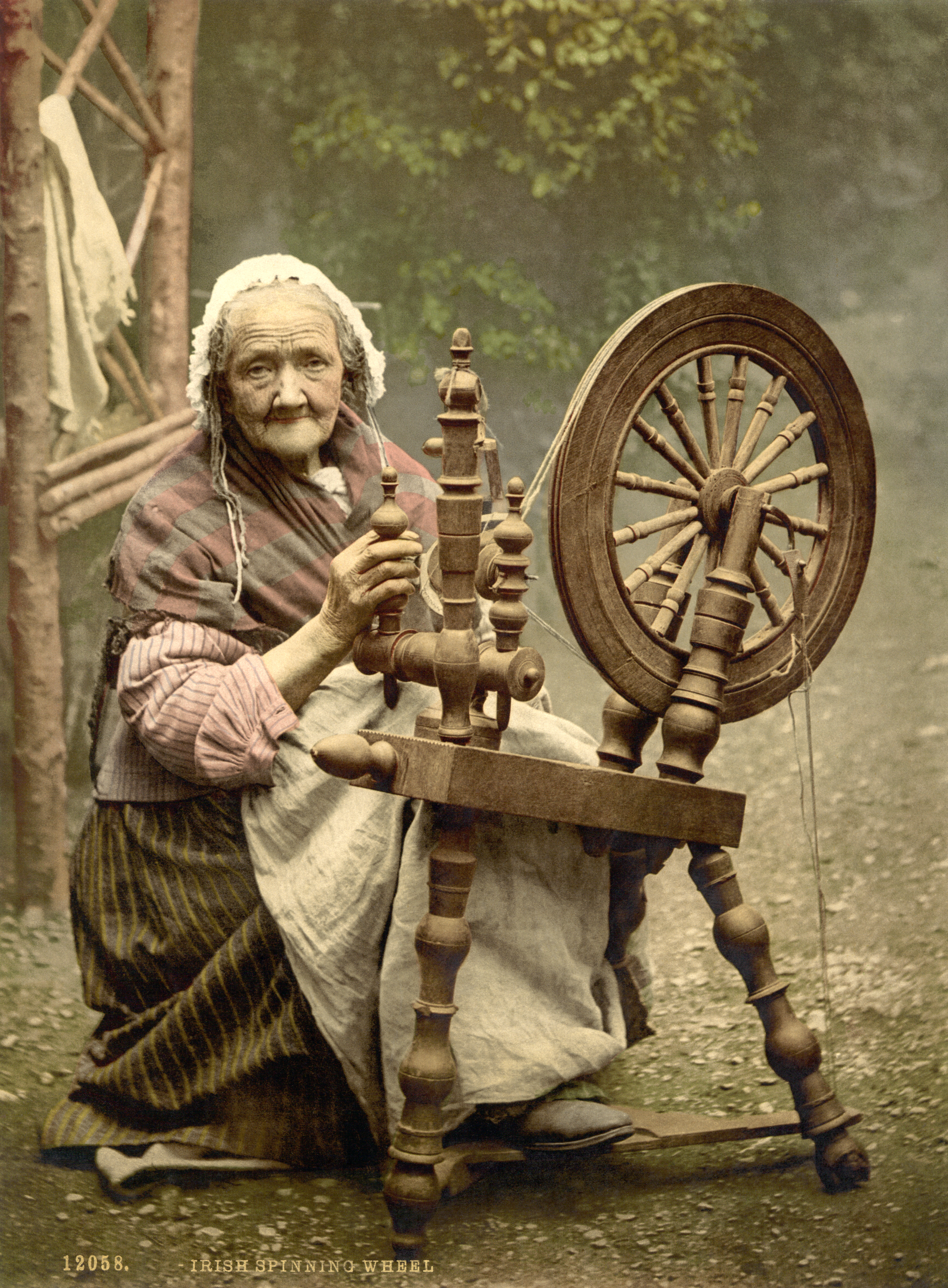 Woman with an Irish spinning wheel