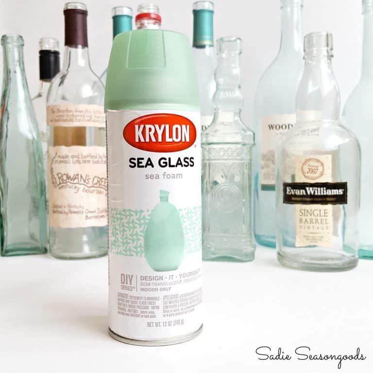 Krylon Sea Glass spray paint in front of empty liquor and wine bottles