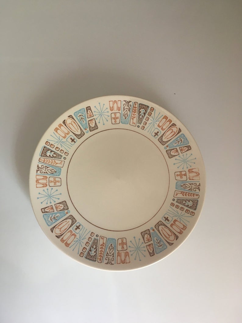 Ceramic plate with blue and brown border