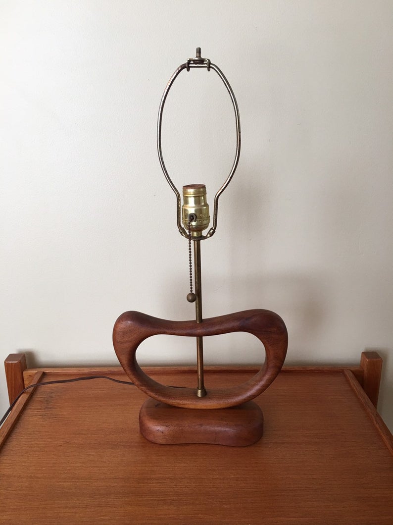 Wood and brass lamp.